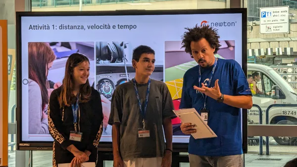 Science communicator presenting distance and speed activity