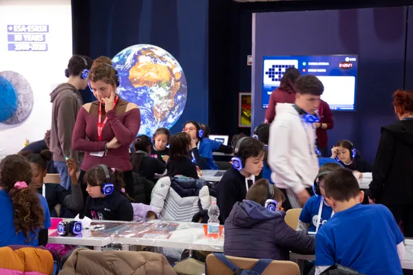 Educators guiding students at ESRIN lab session