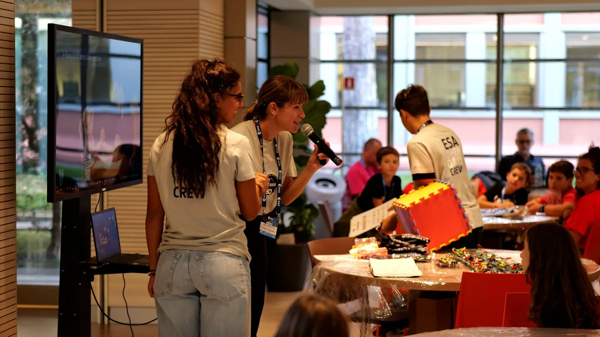 ESA Crew presenting a LEGO building activity with kids
