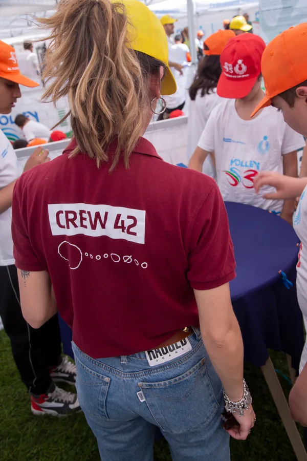 Crew 42 member at an outdoor science event